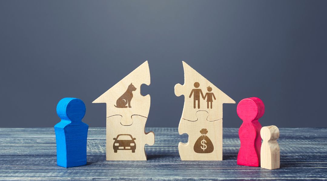 Split house and divorce - wood figures - divorce settlement checklist - Stephanie Krane-Boehmer Law. 