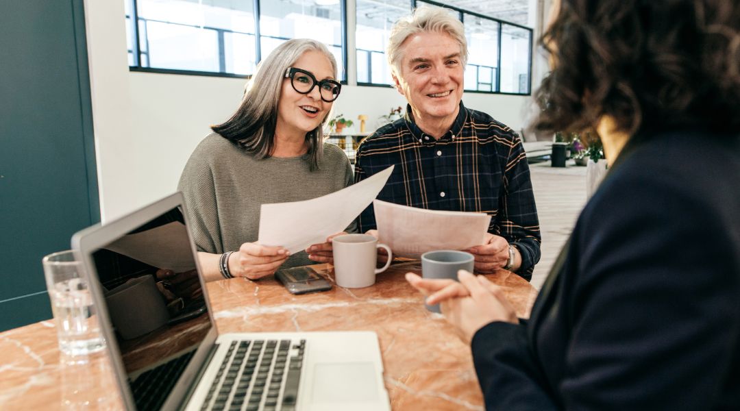 Couple meeting with a lawyer - estate planning mistakes.